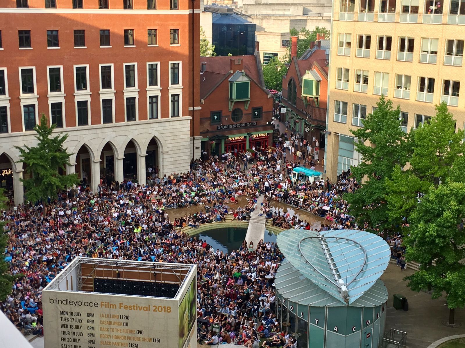 Huge crowd gathered outside in Brindleyplace, Birmingham.