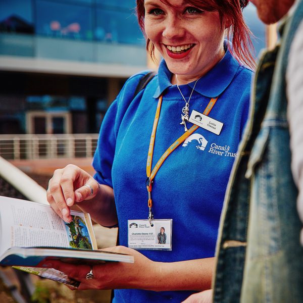 Canal & river trust staff member outside in Brindleyplace, Birmingham.