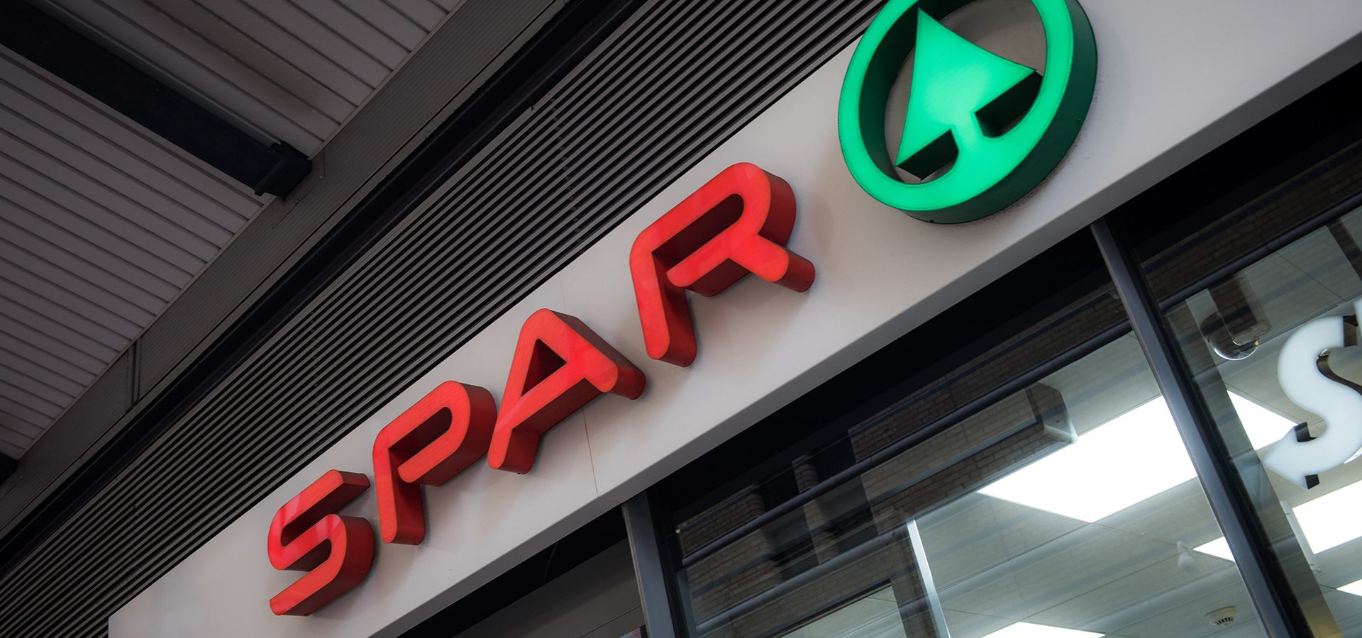Exterior signage at SPAR in Brindleyplace, Birmingham.