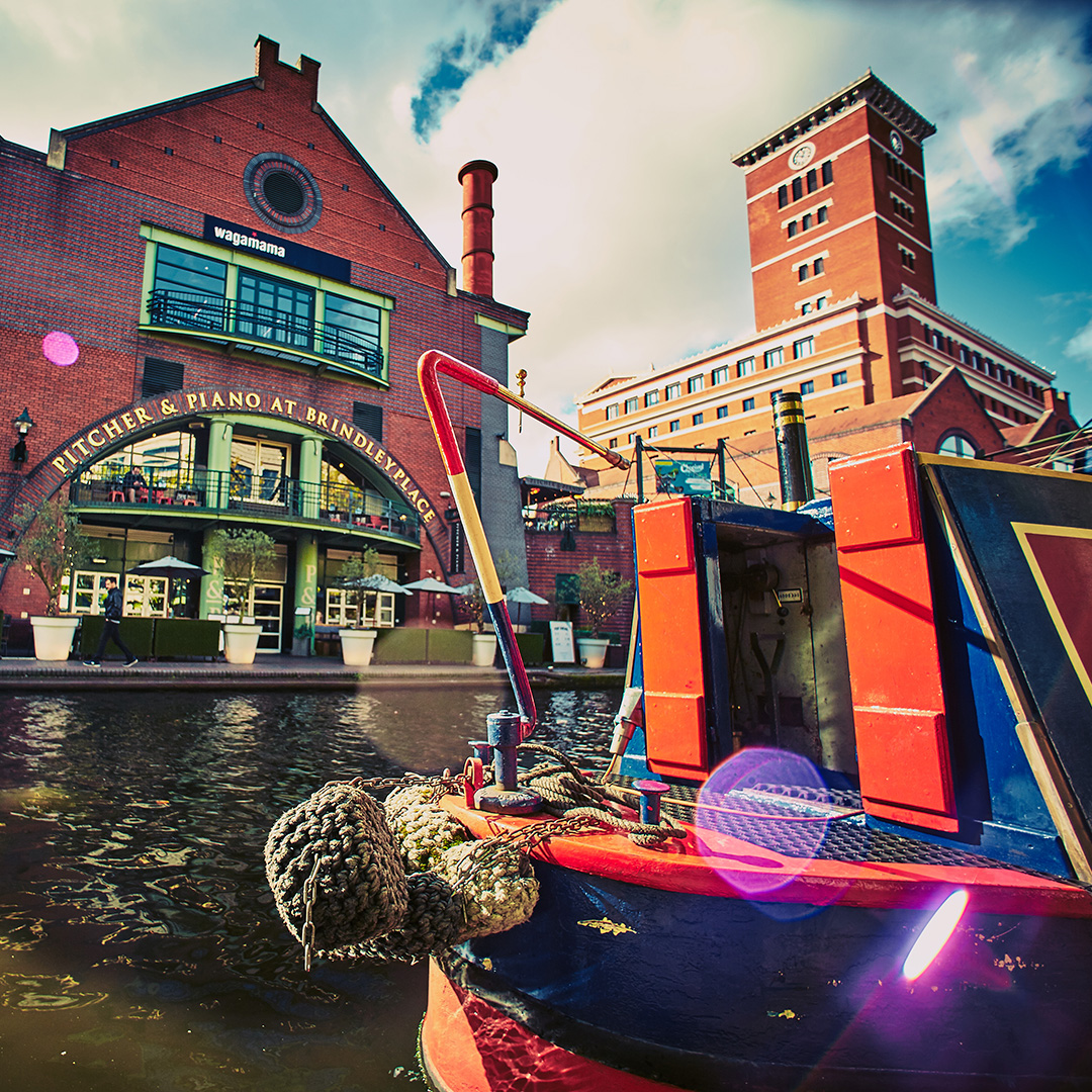 Close-up of canal barge outside the Pitcher & Piano pub at Brindleyplace in Birmingham.
