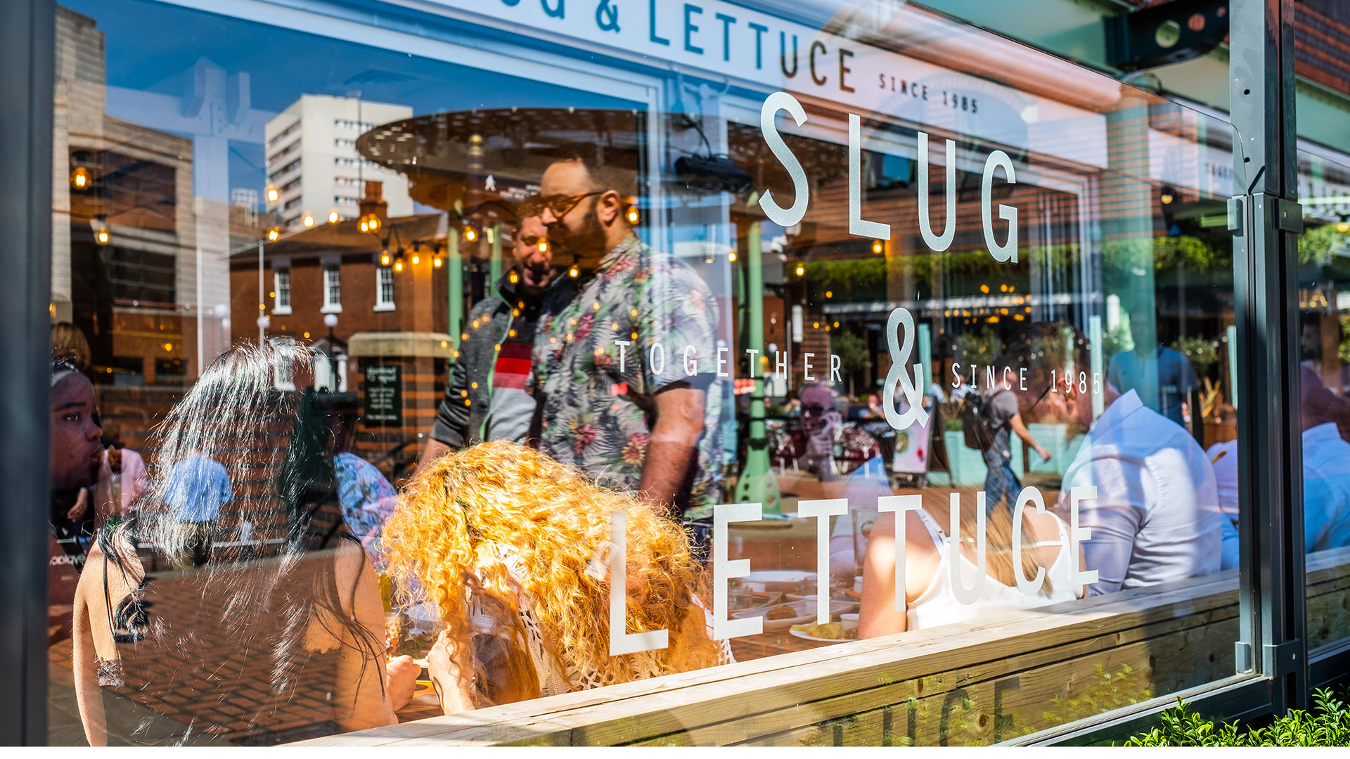 Exterior signage on window of Slug & Lettuce in Brindleyplace, Birmingham.