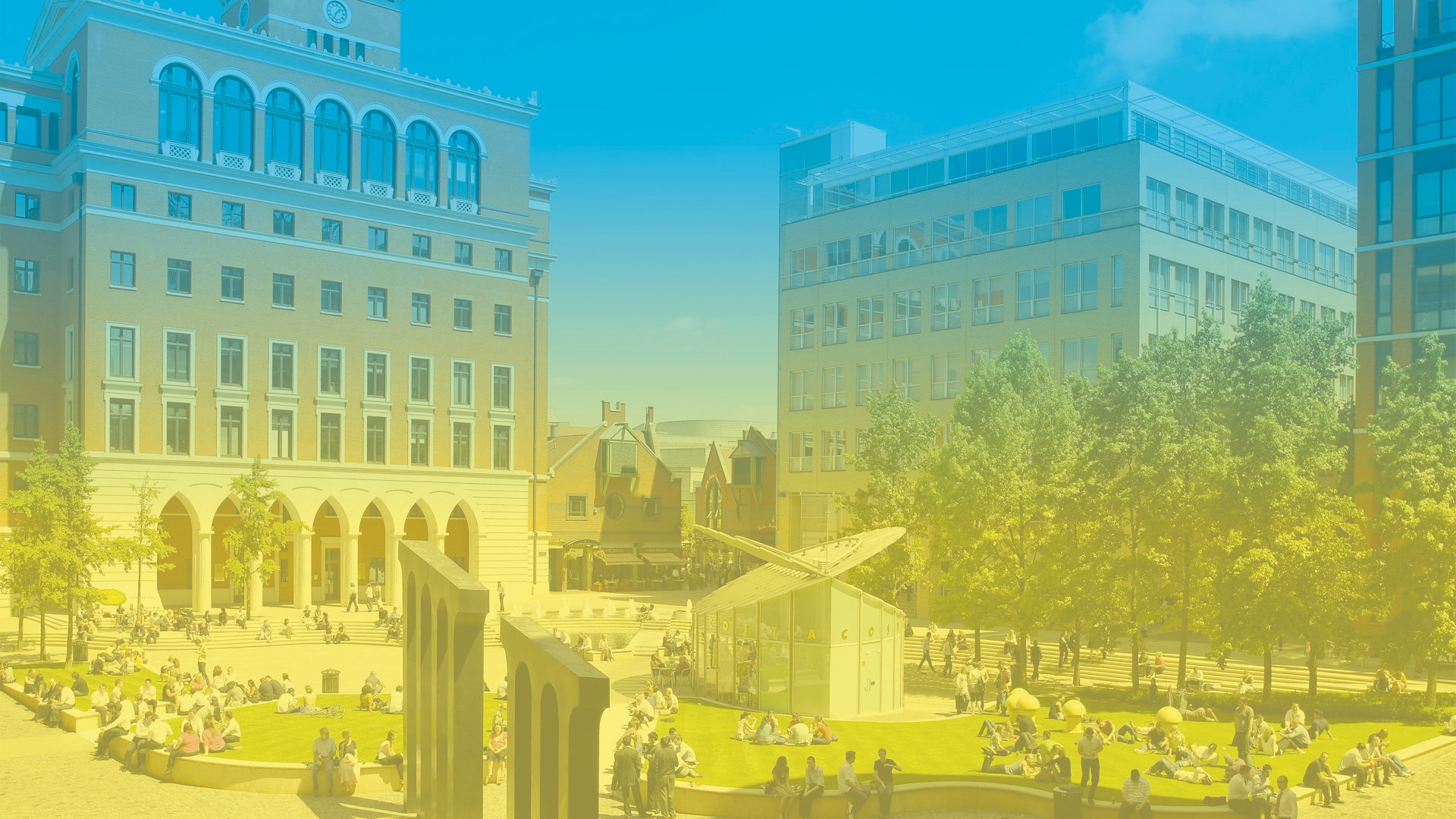 Picture of Brindleyplace Central Square on a beautiful sunny day with a gradient of the Ukrainian flag colours over it from blue to yellow.