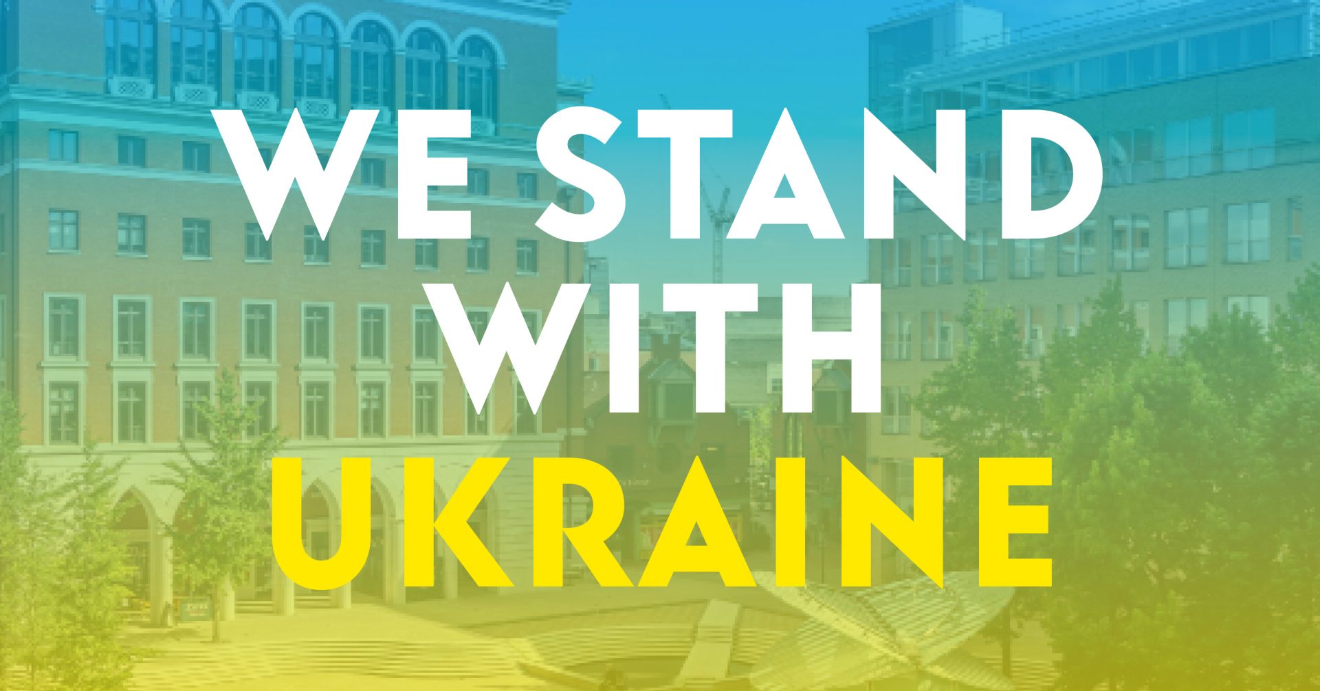 A picture of brindleyplace with a blue to yellow gradient over it with the words We Stand with Ukraine